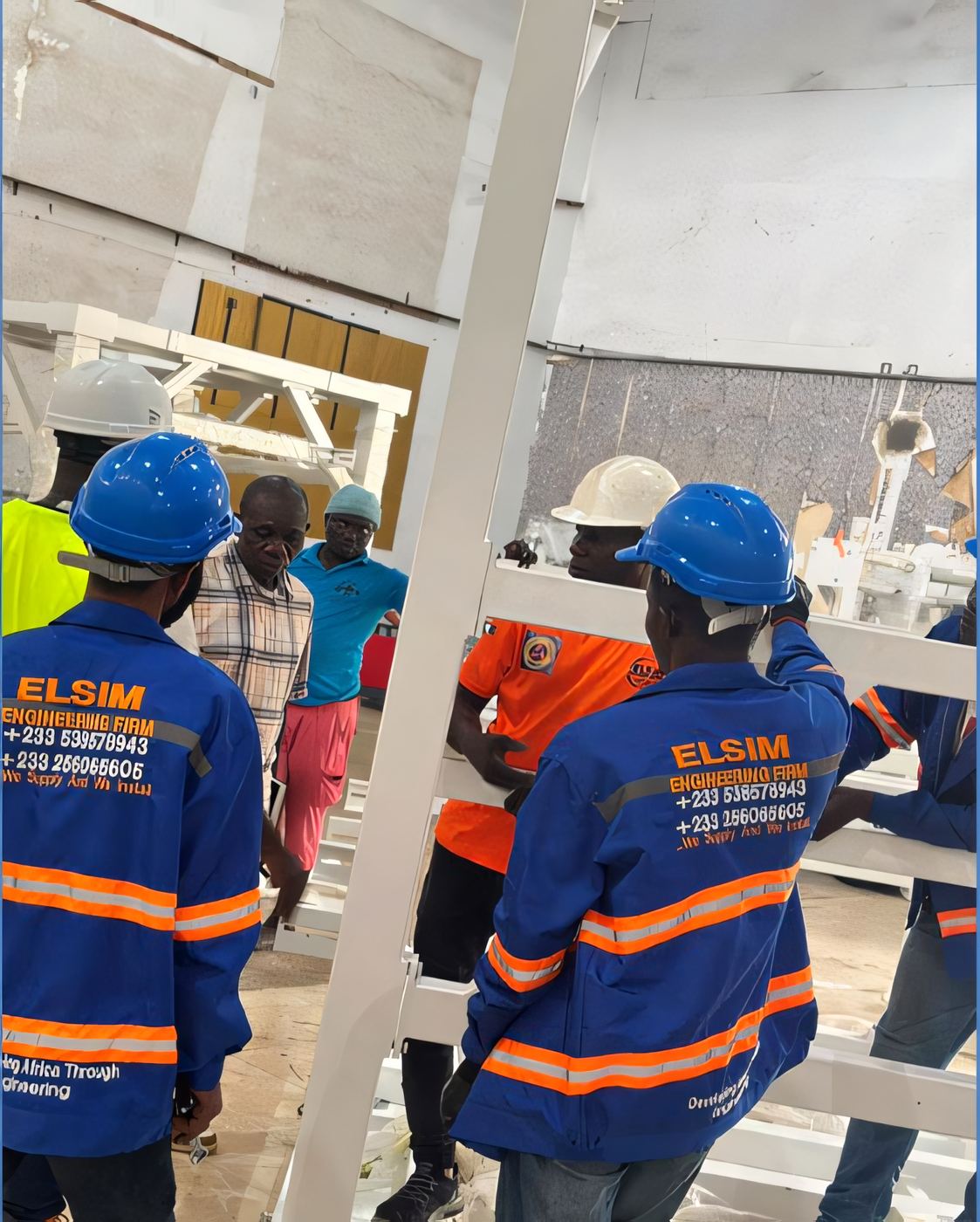 ELSIM technicians assembling an equipment support frame on site
