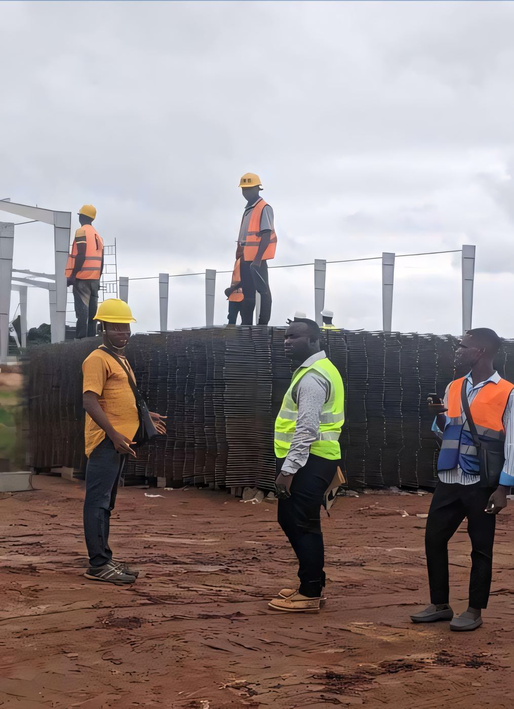 ELSIM supervisors walking a reinforced-concrete construction site