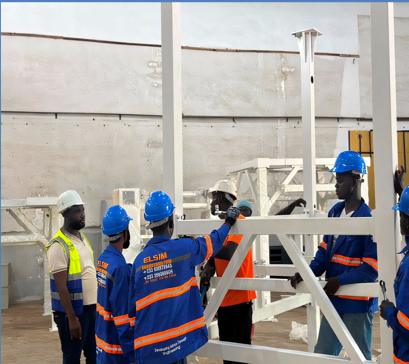 Steel equipment frame being assembled on site by ELSIM crew